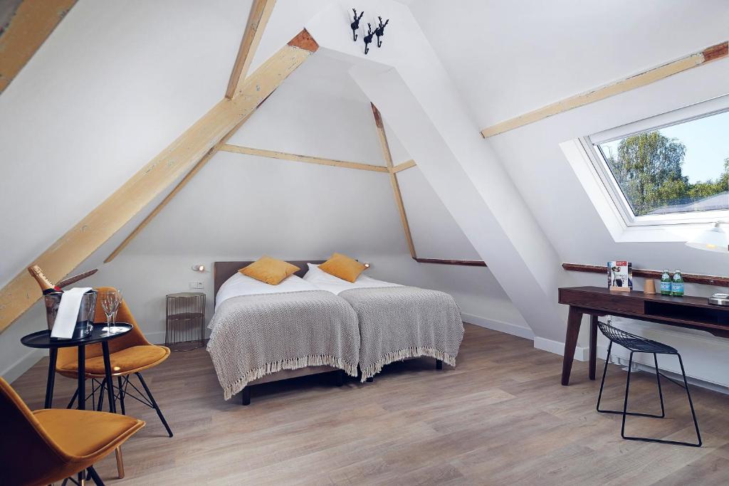 Postel nebo postele na pokoji v ubytování Boutique Hotel Bellevue
