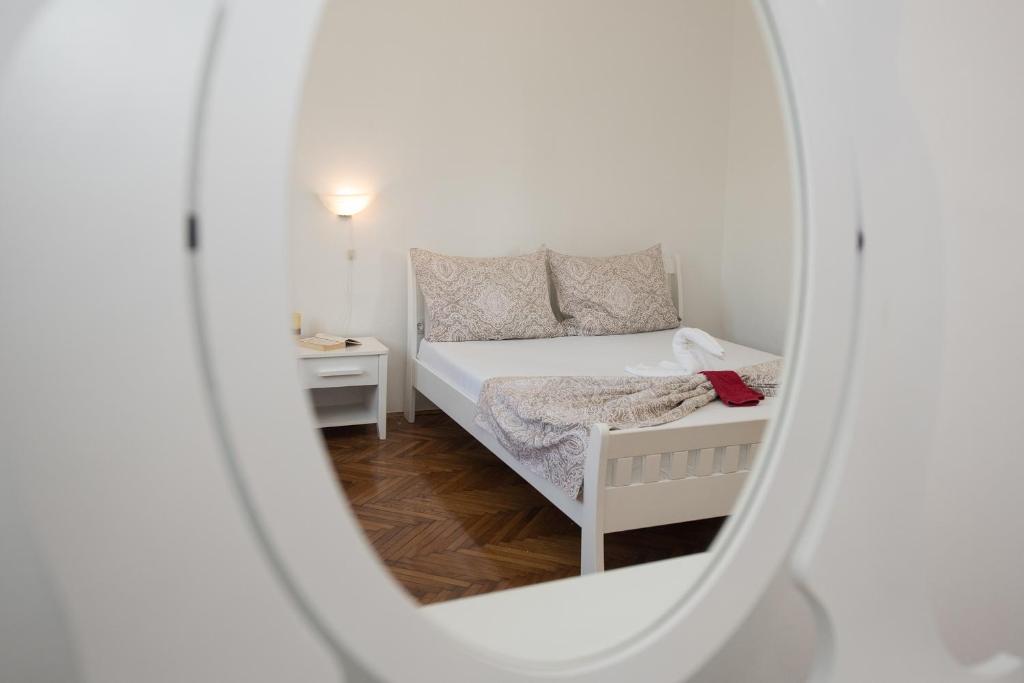 Postel nebo postele na pokoji v ubytování Apartments Smoky M