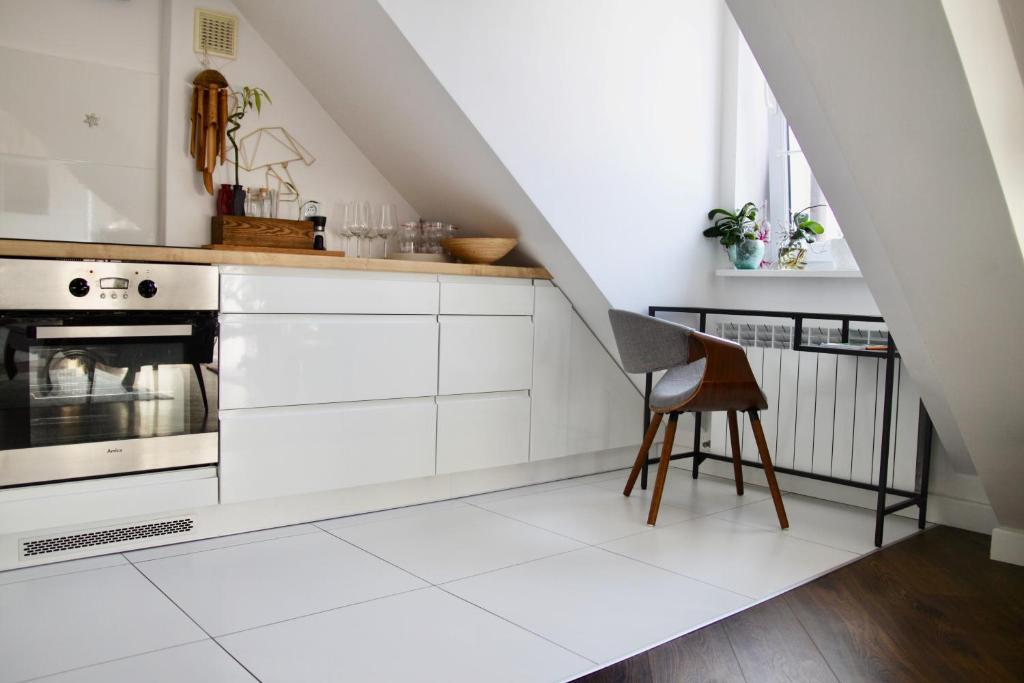 Kuchyňa alebo kuchynka v ubytovaní Apartament Dobre Miejsce