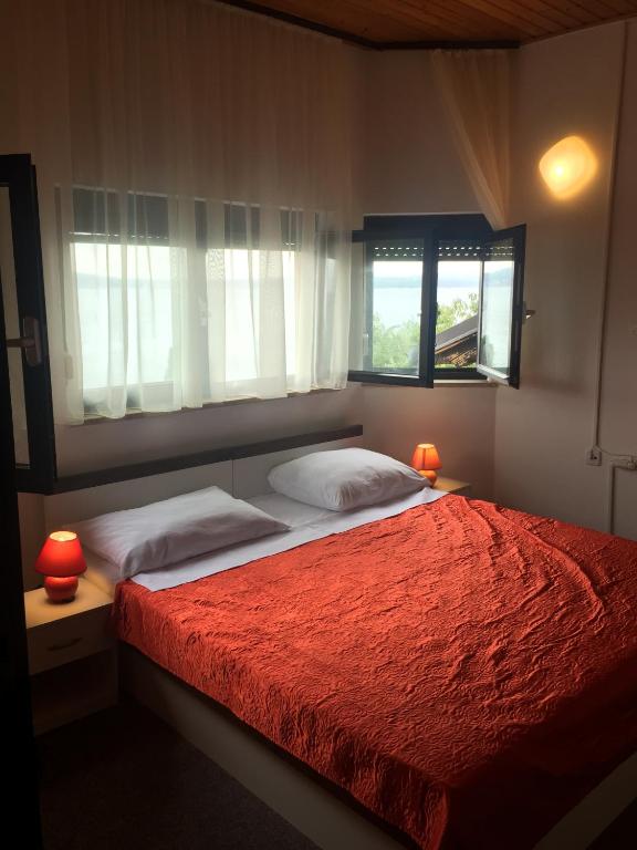 Postel nebo postele na pokoji v ubytování Pansion Ruža