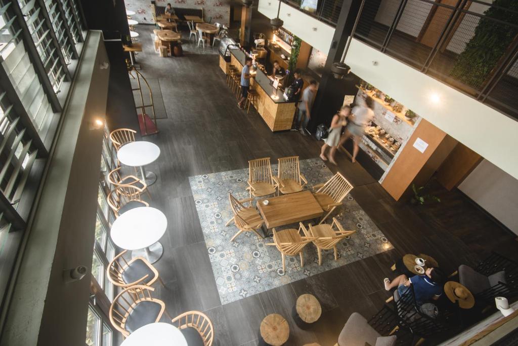 an overhead view of a restaurant with a table and chairs at Cuna Hotel in El Nido