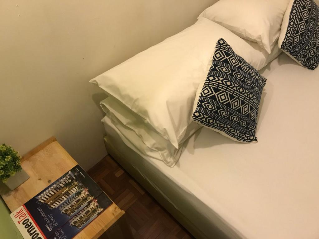 Voodi või voodid majutusasutuse Check In Lodge toas