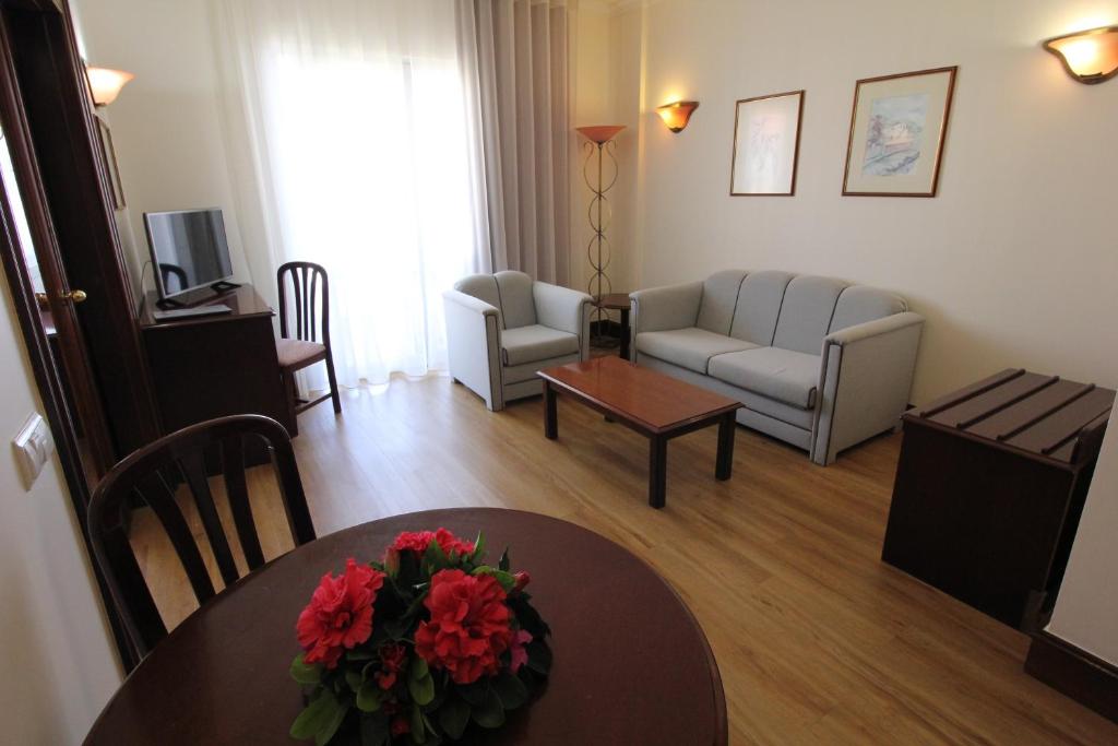 Posezení v ubytování Suite Hotel Jardins Da Ajuda
