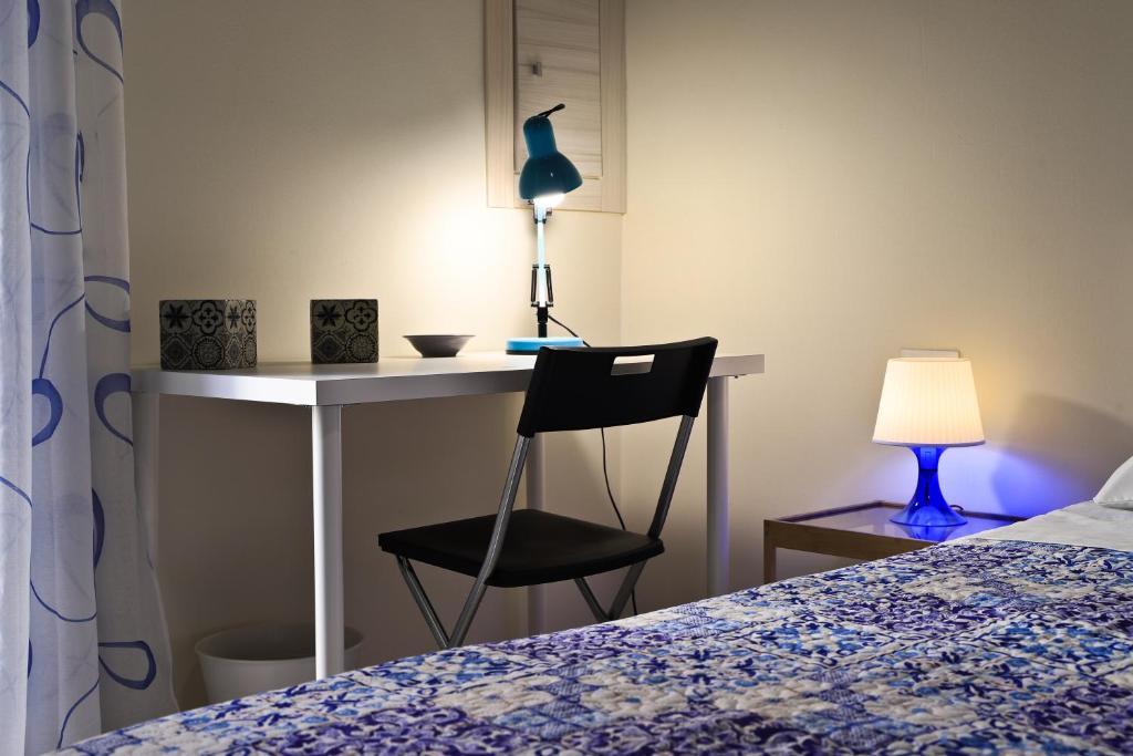 Posteľ alebo postele v izbe v ubytovaní centruMassimo b&b