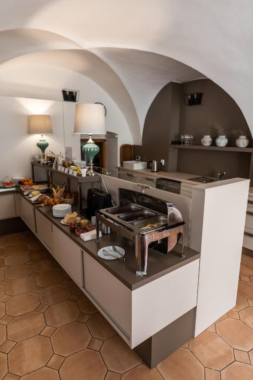 Kuchyň nebo kuchyňský kout v ubytování Hotel Clemar