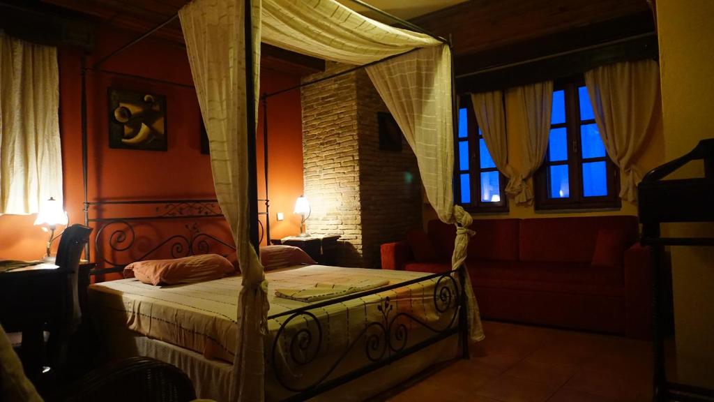 Posteľ alebo postele v izbe v ubytovaní Muses Country House