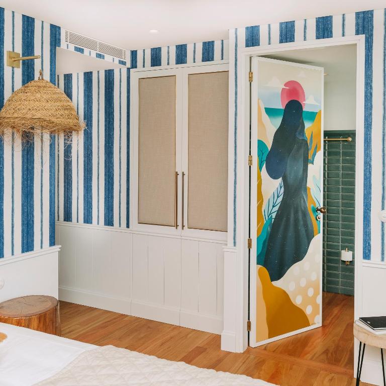 Postel nebo postele na pokoji v ubytování Gran Cruz House
