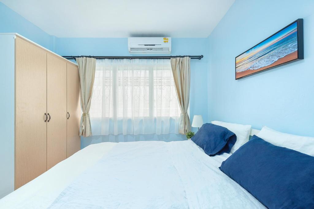 Postel nebo postele na pokoji v ubytování Mein Haus @Bangsan
