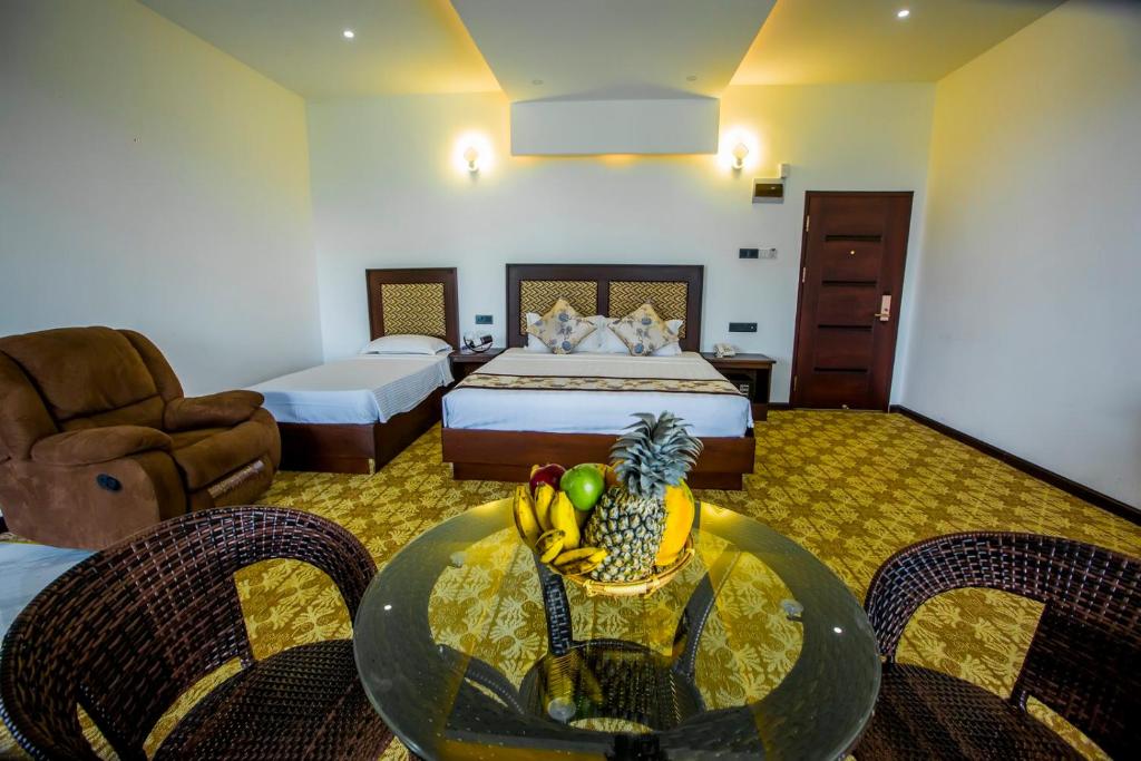Postel nebo postele na pokoji v ubytování Euro Star Hotel