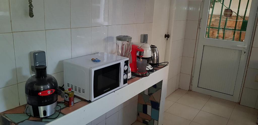 Kuchyň nebo kuchyňský kout v ubytování Surf House Hostel