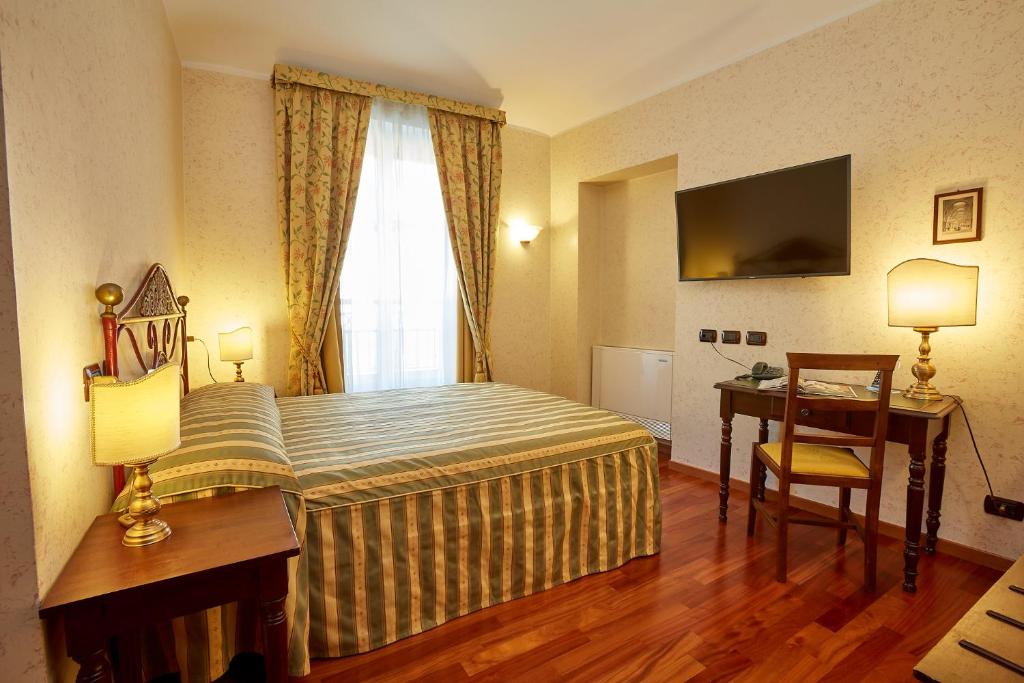 TV a/nebo společenská místnost v ubytování Liberty Hotel