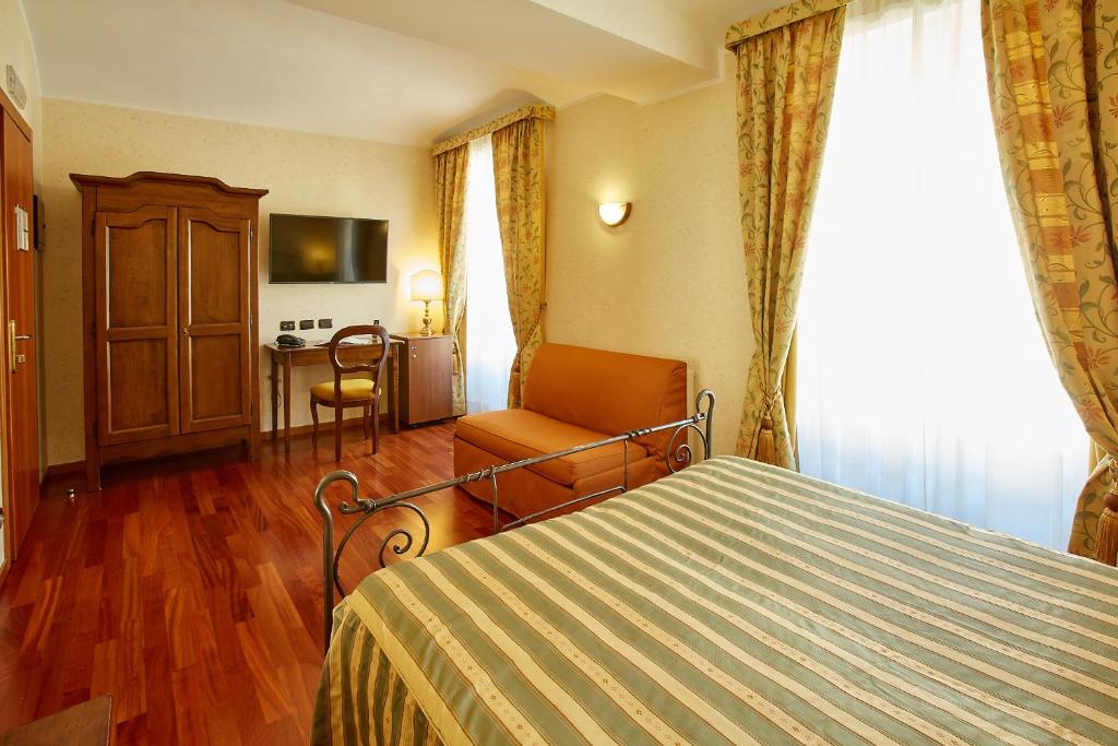 TV a/nebo společenská místnost v ubytování Liberty Hotel