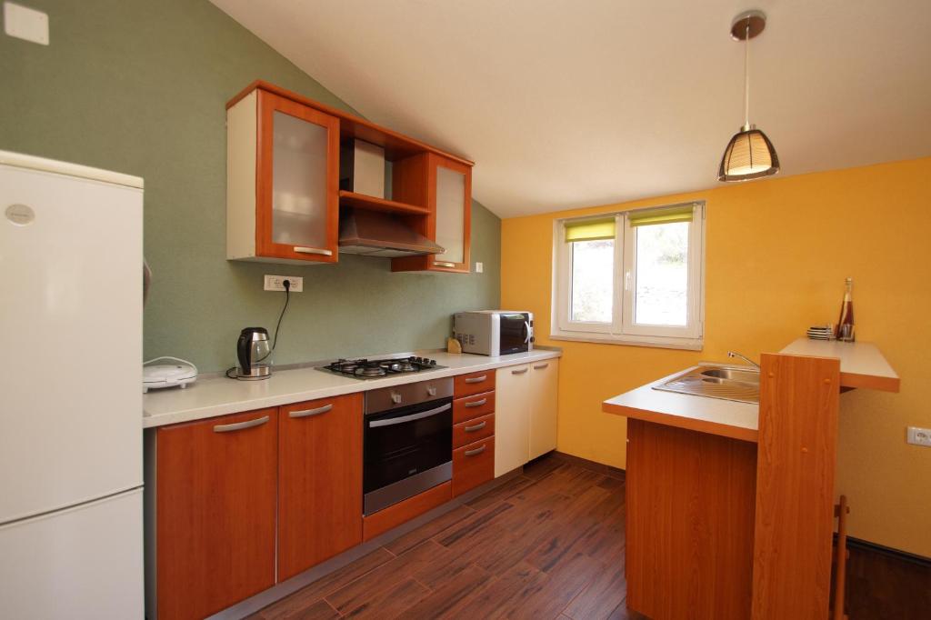 Kuchyň nebo kuchyňský kout v ubytování Apartment Ka3