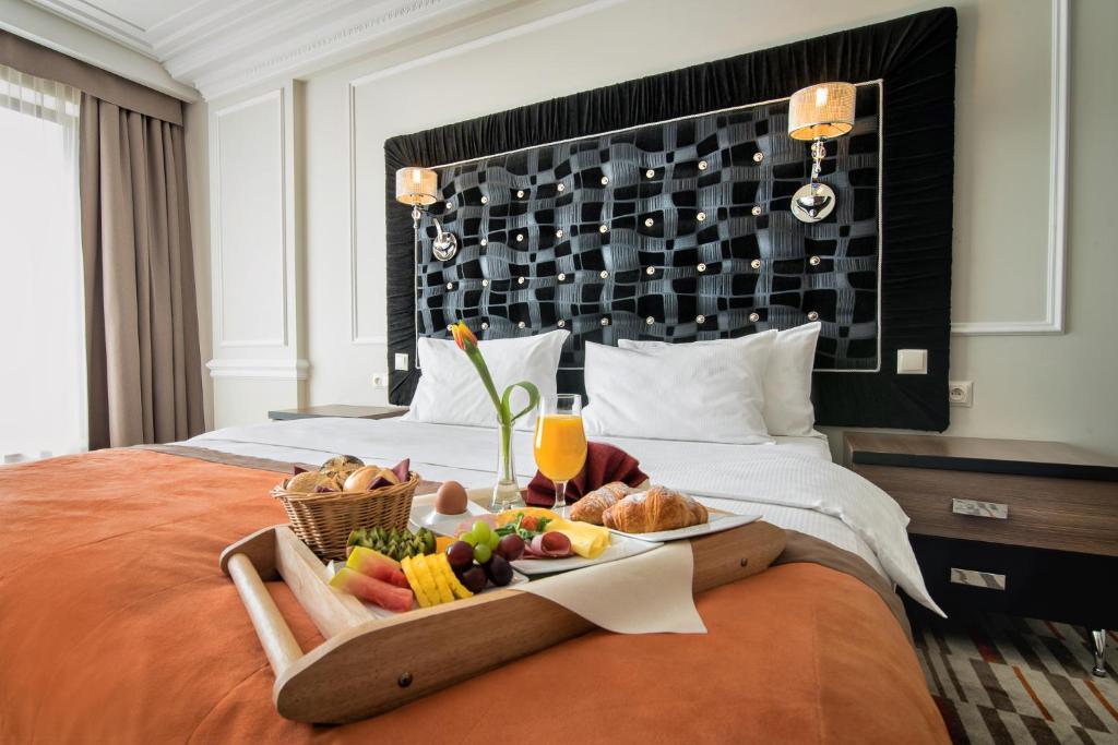 Postel nebo postele na pokoji v ubytování Hotel Kawallo