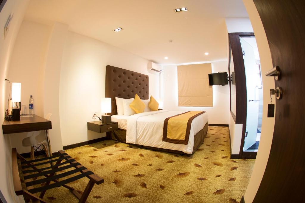 Postel nebo postele na pokoji v ubytování City Hotel Colombo 02