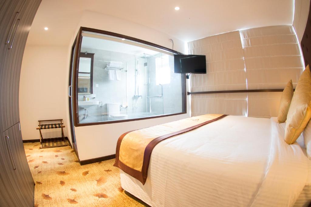 Postel nebo postele na pokoji v ubytování City Hotel Colombo 02