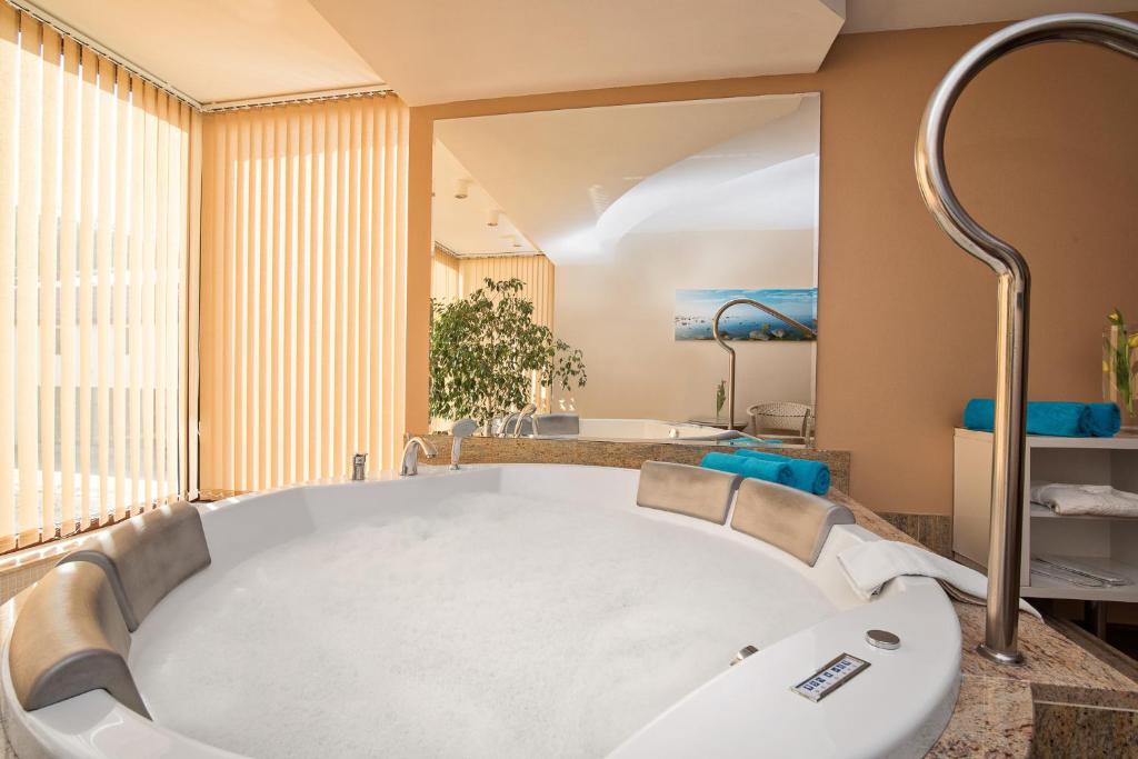 Koupelna v ubytování Hotel Kawallo