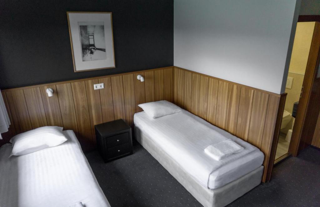 Postel nebo postele na pokoji v ubytování Hotel Skaftafell