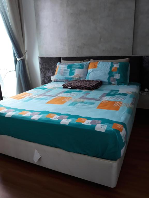 Voodi või voodid majutusasutuse Tini Icity Guesthouse toas
