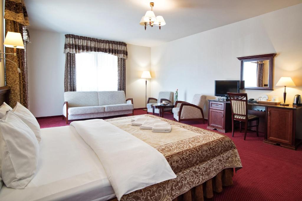 Postel nebo postele na pokoji v ubytování Hotel Kawallo