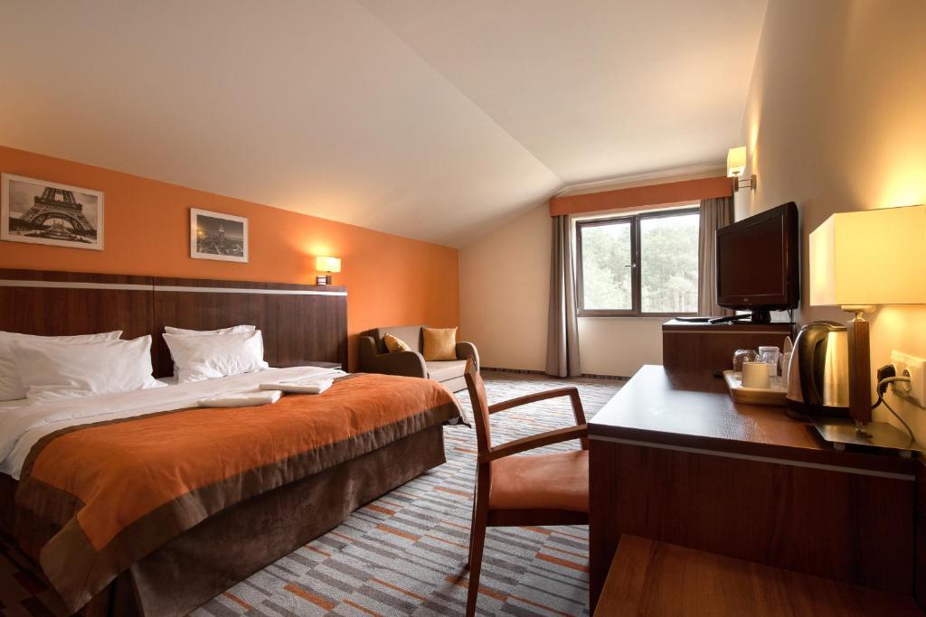 Postel nebo postele na pokoji v ubytování Hotel Kawallo