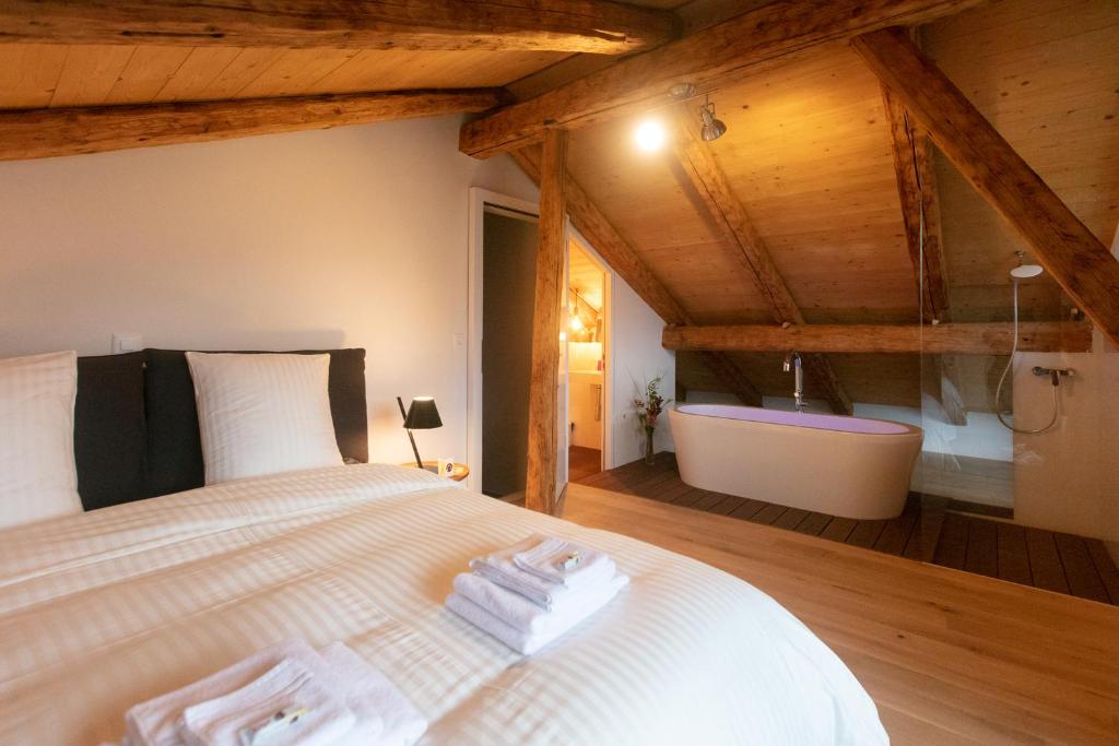 Postel nebo postele na pokoji v ubytování La Grande Maison