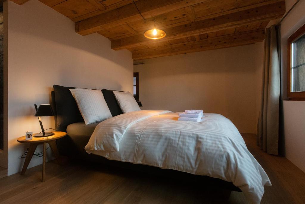 Postel nebo postele na pokoji v ubytování La Grande Maison