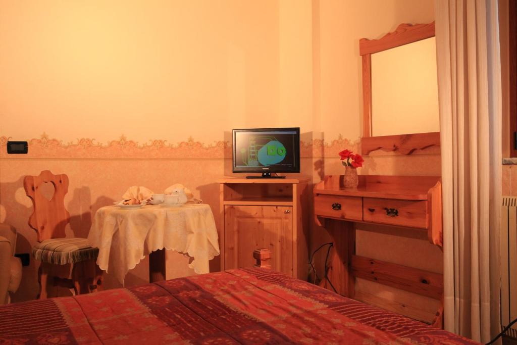 TV a/nebo společenská místnost v ubytování Hotel Centrale