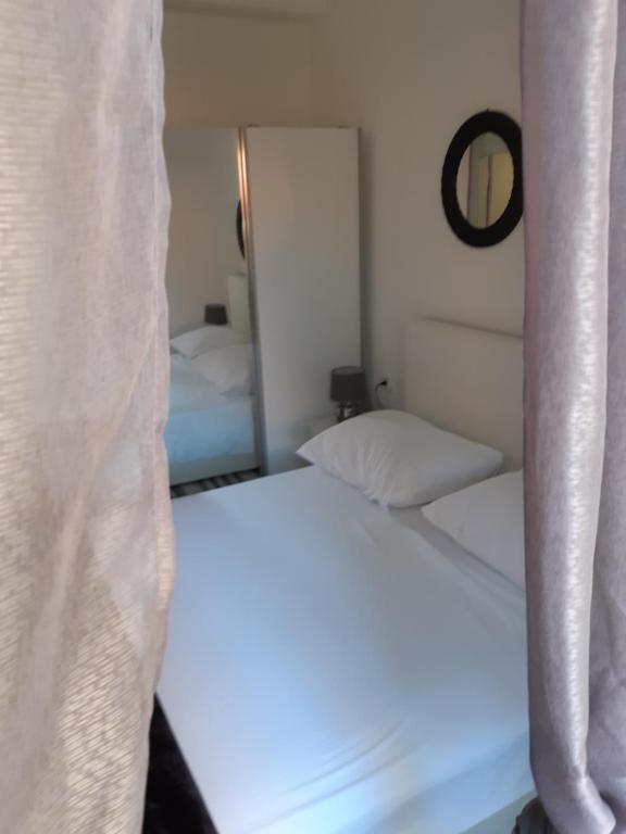 Postel nebo postele na pokoji v ubytování Sebenico Luxury Rooms