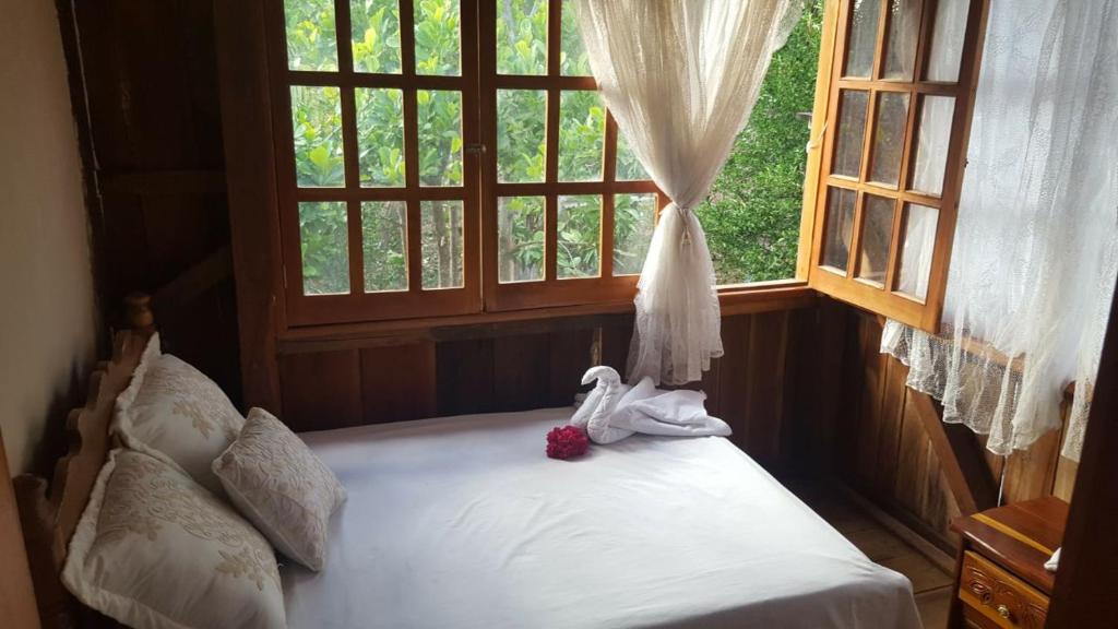 Postel nebo postele na pokoji v ubytování Posada los Reyecitos