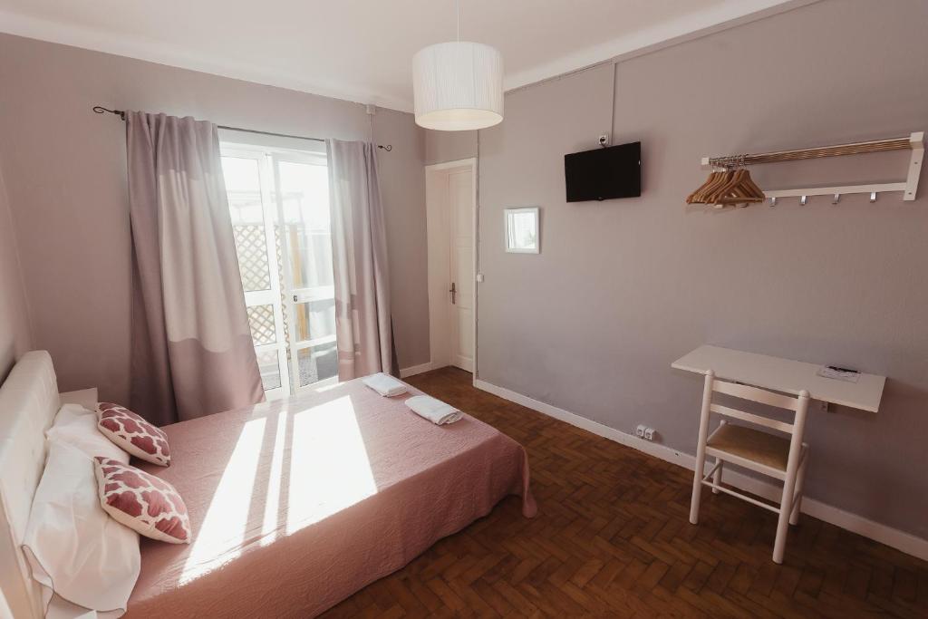 Postel nebo postele na pokoji v ubytování Brivaldo Guest House