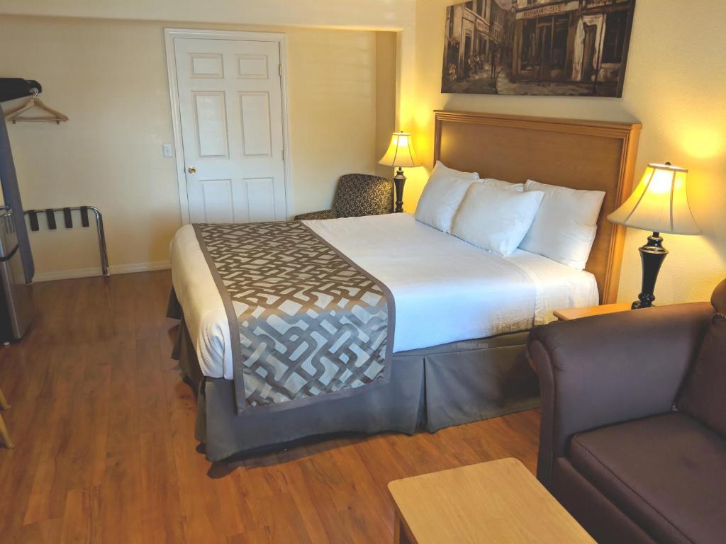 Postel nebo postele na pokoji v ubytování Wittle Motel