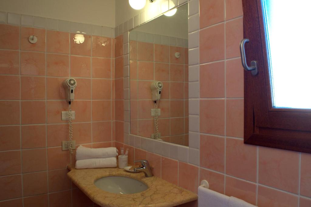 Kúpeľňa v ubytovaní Cala Paradiso Residence