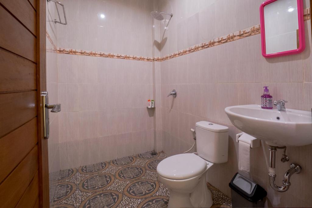 Koupelna v ubytování Omank Agus Homestay