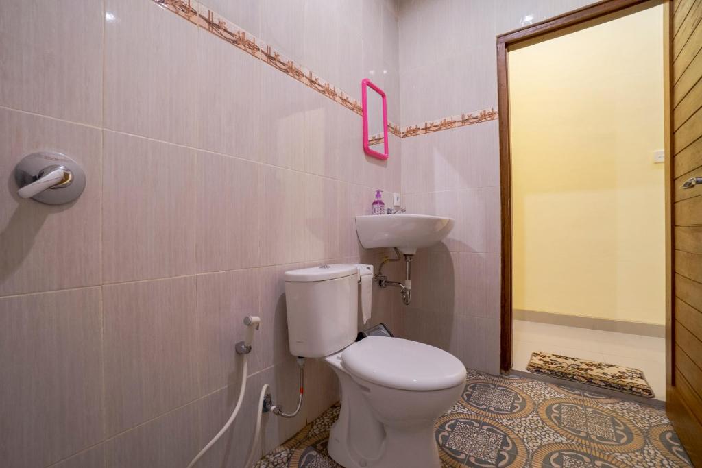 Koupelna v ubytování Omank Agus Homestay