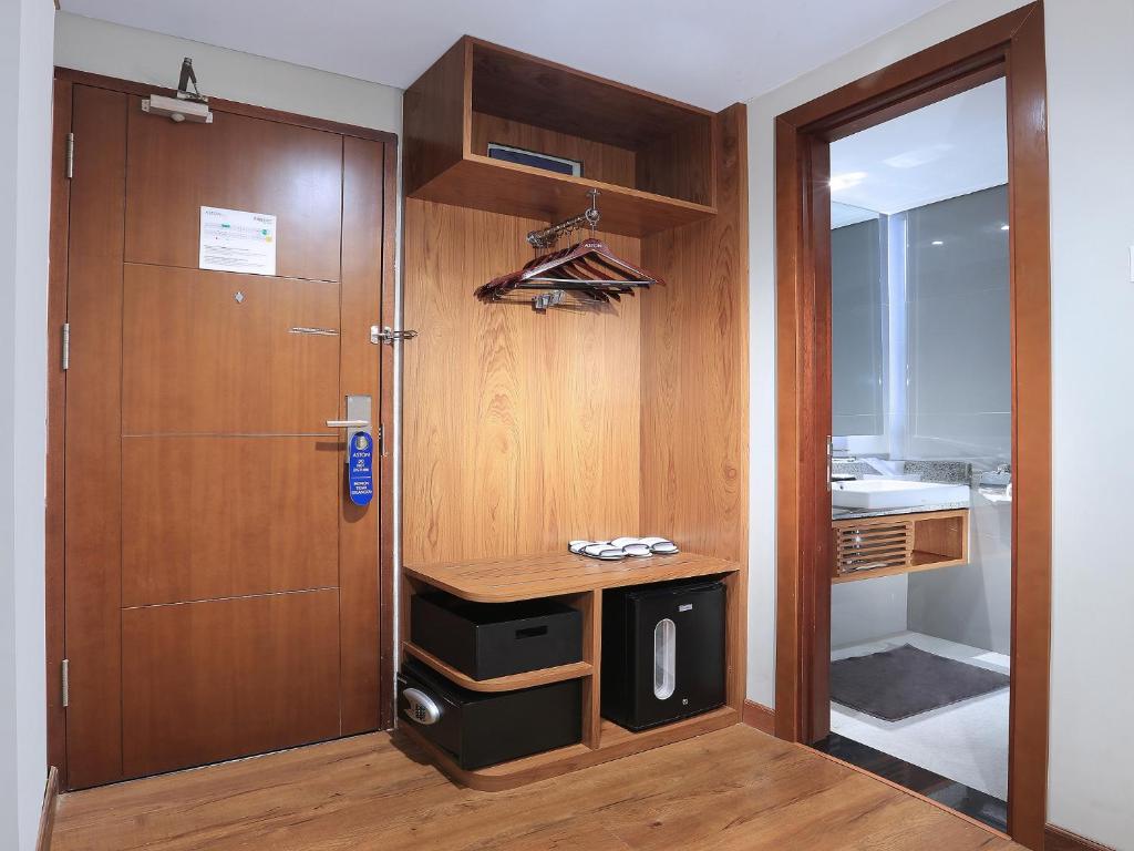 Koupelna v ubytování Aston Inn Batu