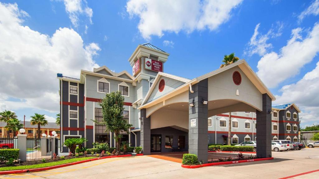 a rendering of a hotel with a building at Best Western Plus Northwest Inn and Suites Houston in Houston