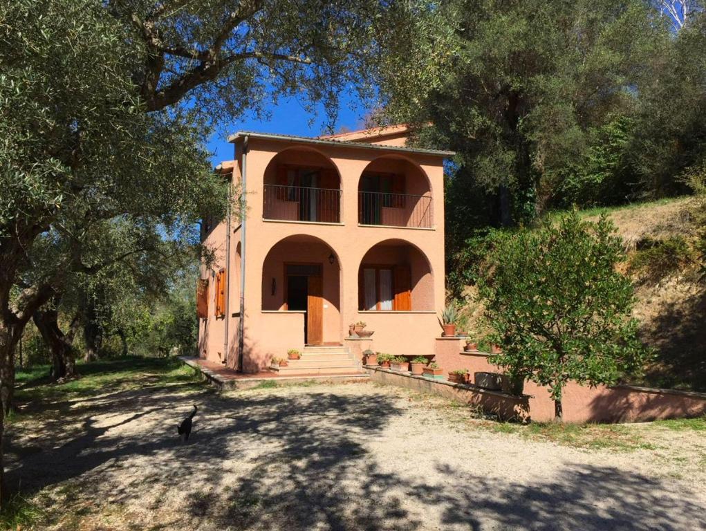 a large house with a staircase in front of it at Argentella House in Palombara Sabina