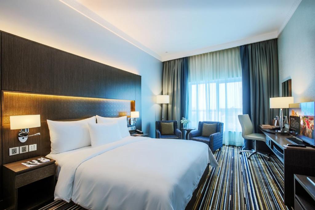 Postel nebo postele na pokoji v ubytování Dusit D2 Kenz Hotel Dubai