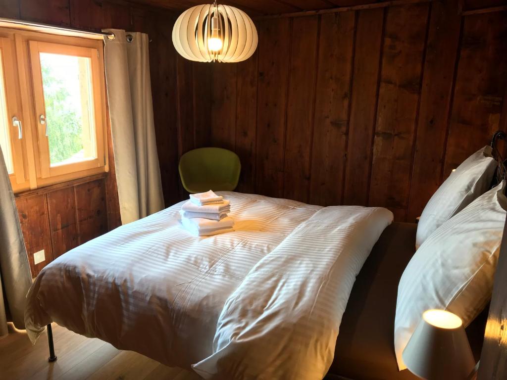 Postel nebo postele na pokoji v ubytování La Grande Maison