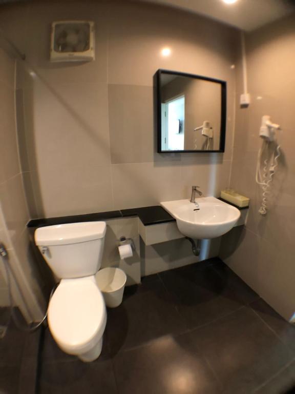 Koupelna v ubytování Paragon Inn