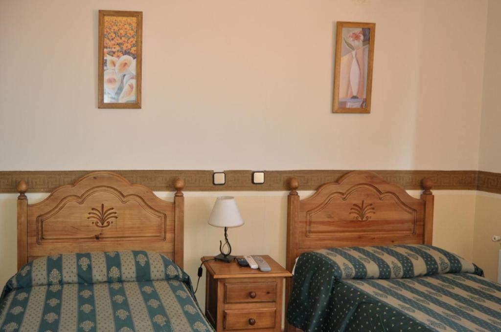 Postel nebo postele na pokoji v ubytování La Fuensanta Hostal-Rural