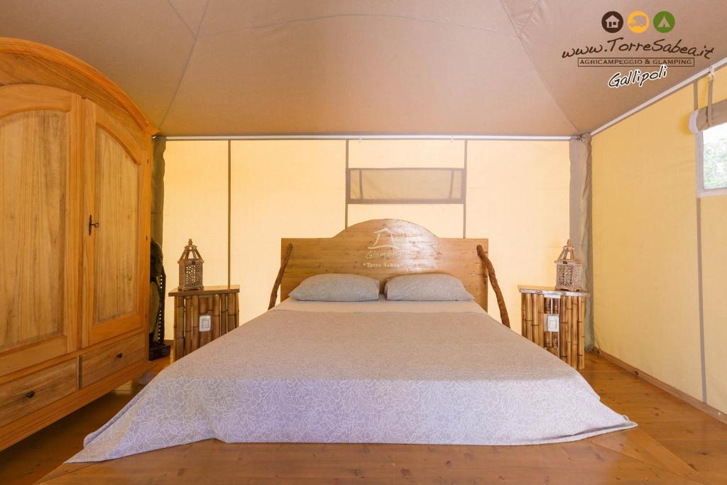 Postel nebo postele na pokoji v ubytování Torre Sabea