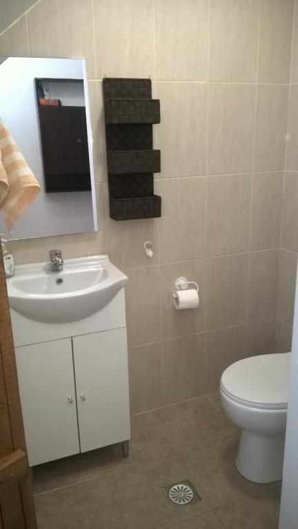 Kúpeľňa v ubytovaní Komissa΄s Beach House