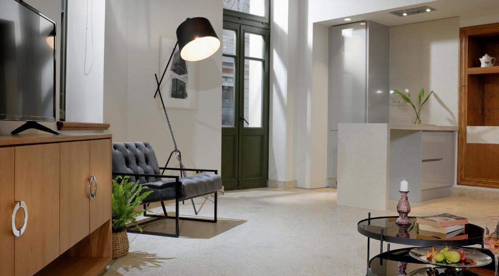 Televízia a/alebo spoločenská miestnosť v ubytovaní Thission Luxury Homes & SPA by K&K