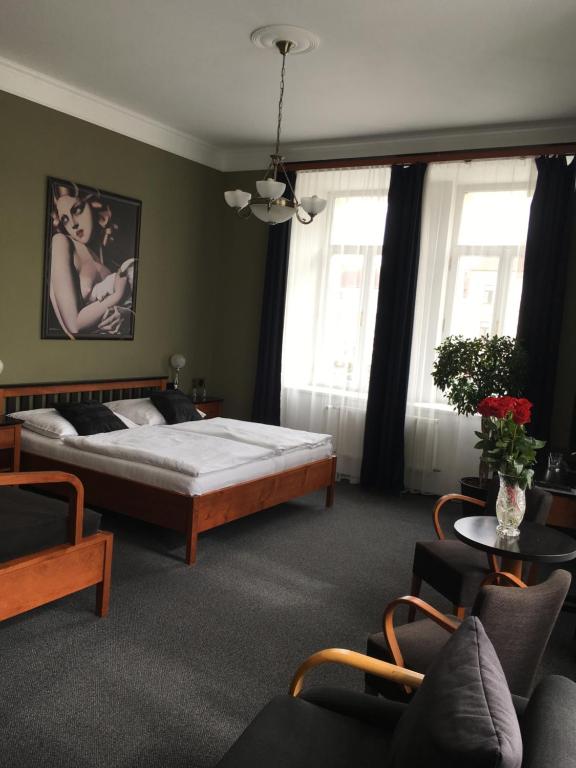Postel nebo postele na pokoji v ubytování Hotel Havel