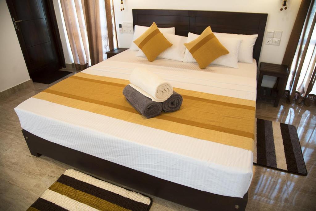 Postel nebo postele na pokoji v ubytování Wadula Safari - Yala