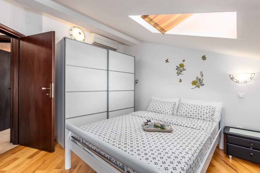 Postel nebo postele na pokoji v ubytování Villa Angeli