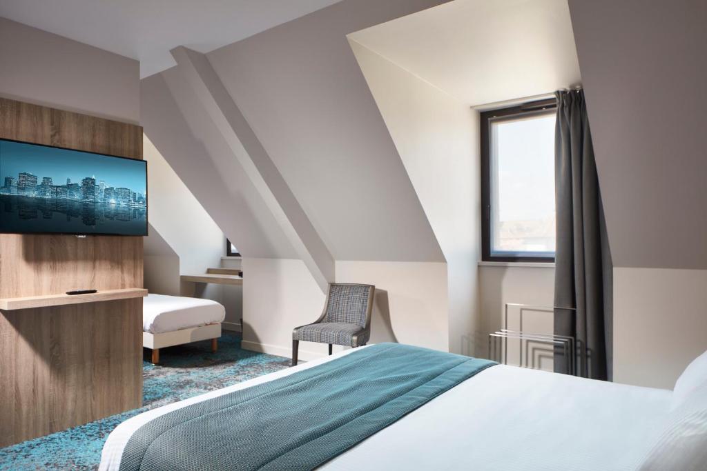 Postel nebo postele na pokoji v ubytování Hôtel Maison Turenne