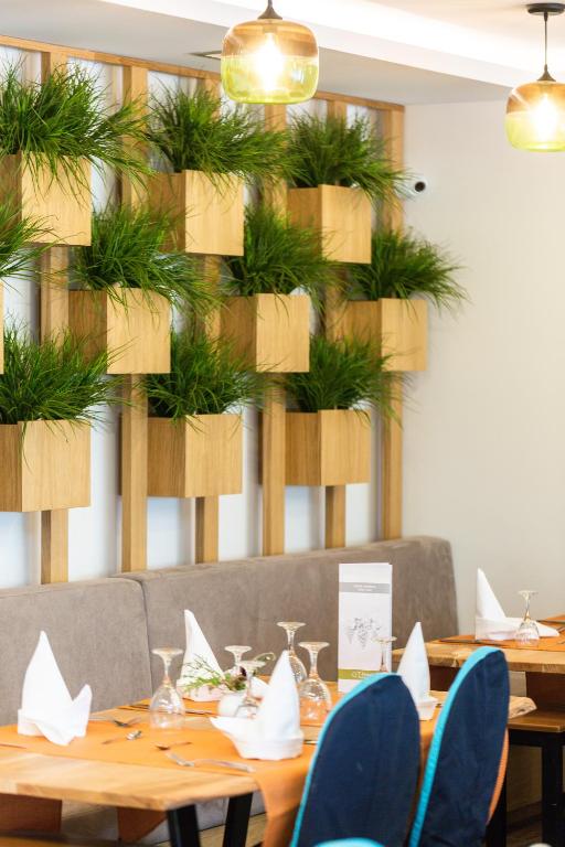 Reštaurácia alebo iné gastronomické zariadenie v ubytovaní T Hotel Premium Suites